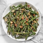 Roasted garlic parmesan green beans on a plate.
