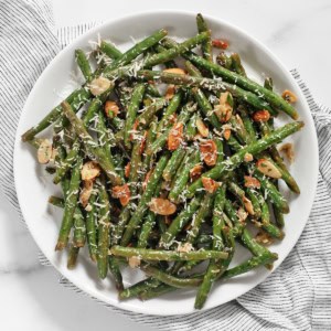 Roasted garlic parmesan green beans on a plate.