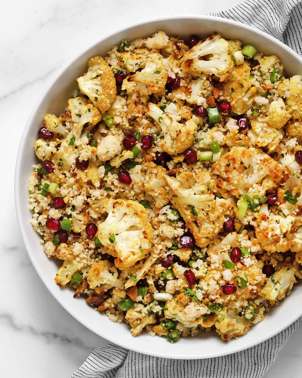 Tahini roasted cauliflower couscous in a bowl.