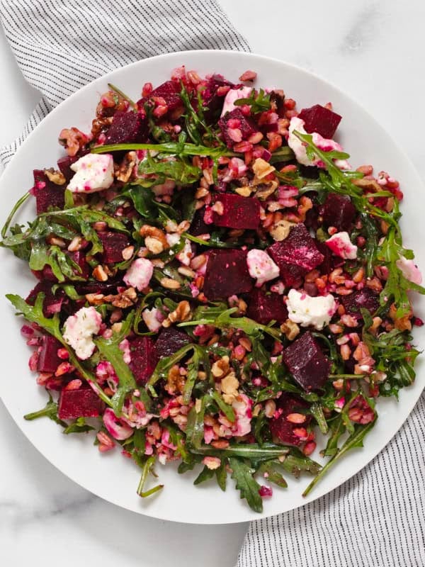 Roasted beet feta farro salad on a plate.