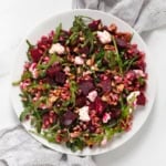 Roasted beet feta farro salad on a plate.