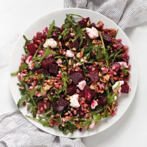 Roasted beet feta farro salad on a plate.