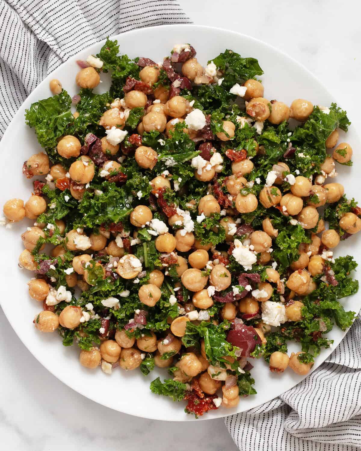 Kale chickpea salad on a plate.