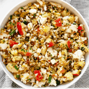 Roasted cauliflower chopped salad in a bowl.
