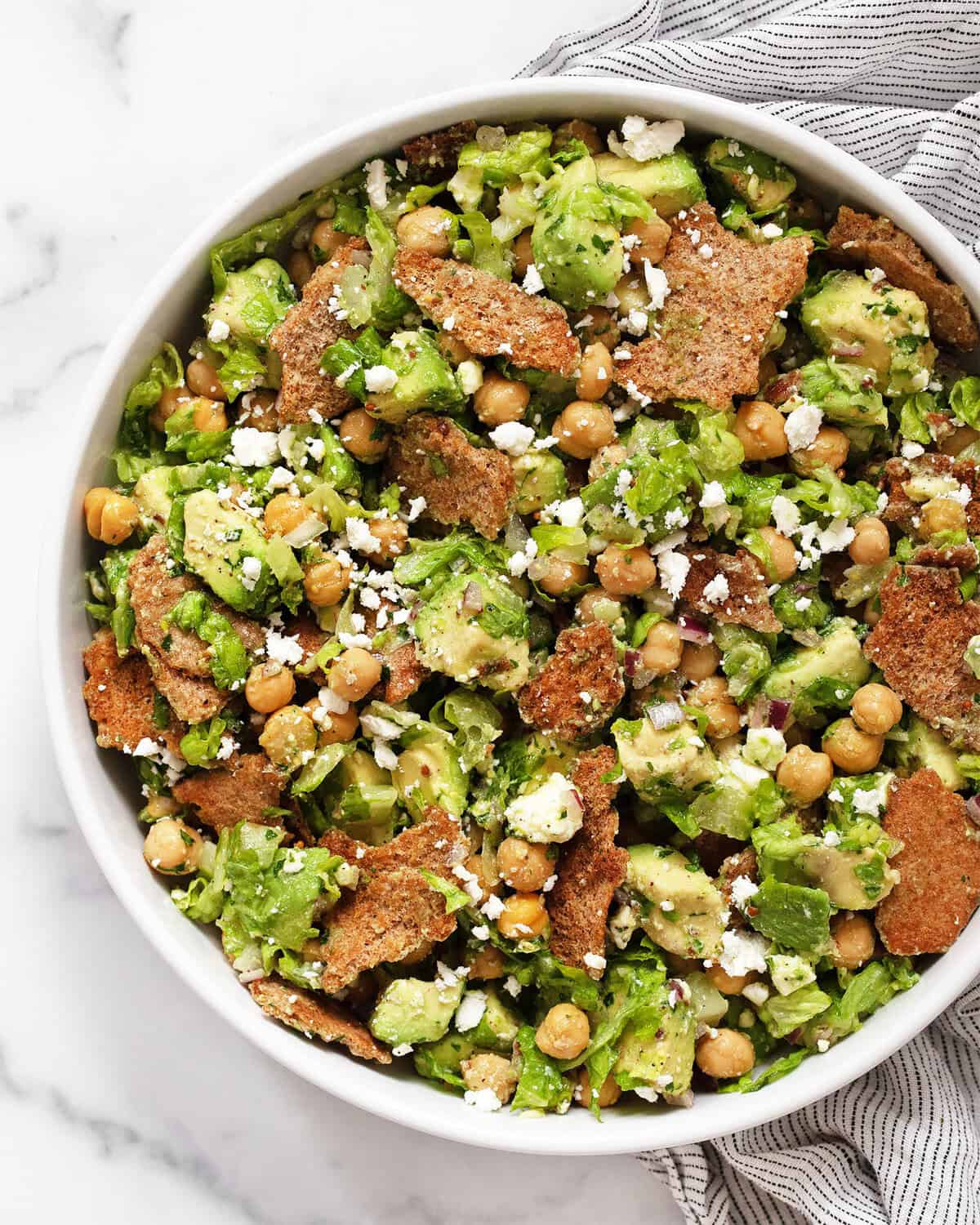 Chickpea avocado salad in a serving bowl.