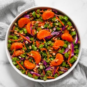 Snap pea citrus salad in a bowl.