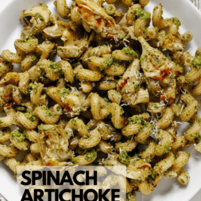 Roasted artichoke pasta with spinach pesto on a plate.