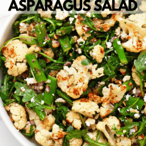 Roasted asparagus cauliflower salad in a bowl.