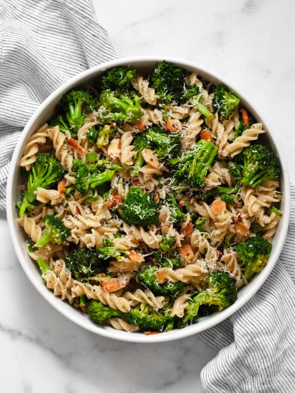 Roasted broccoli pasta salad in a bowl.