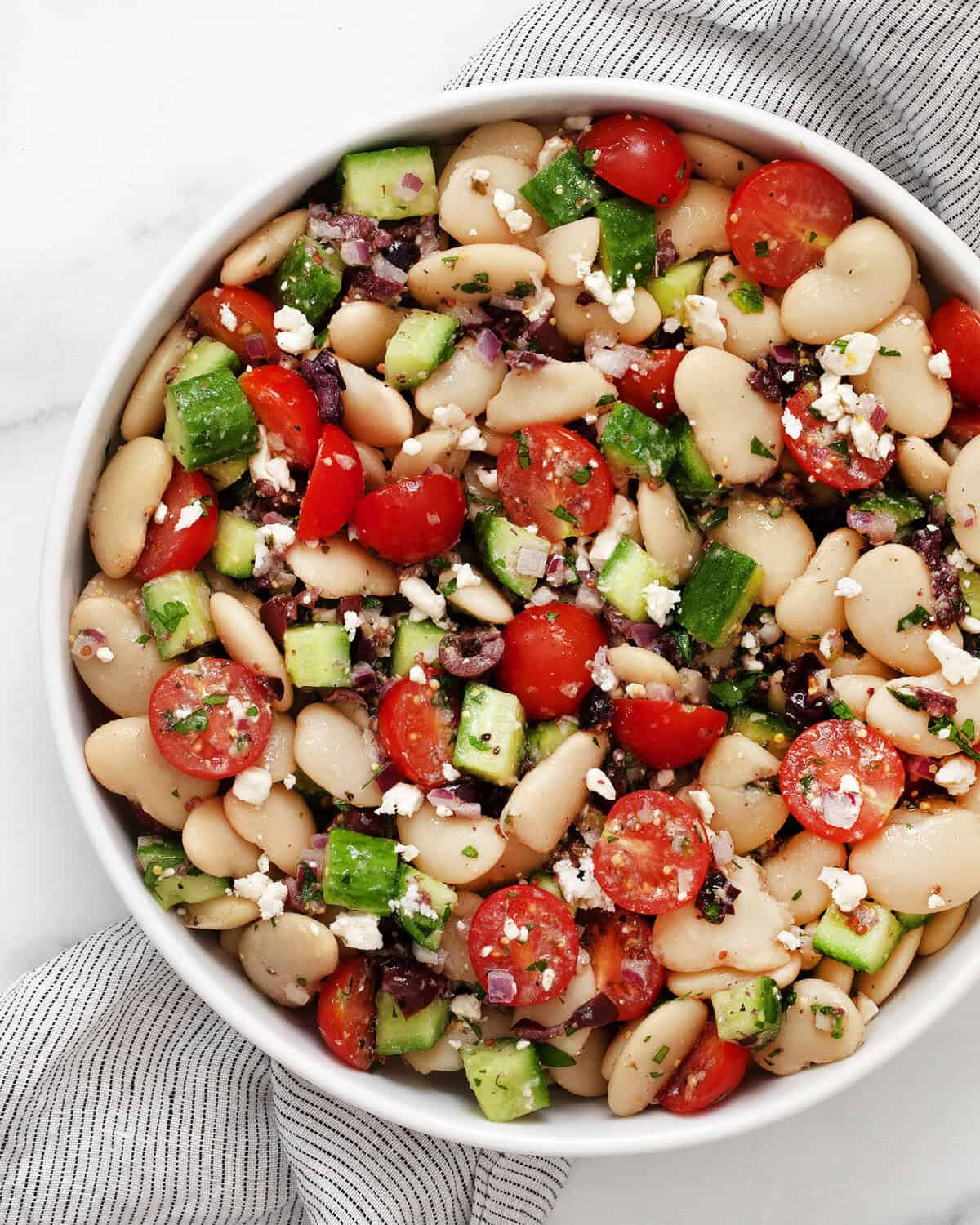 Butter bean salad in a serving bowl.
