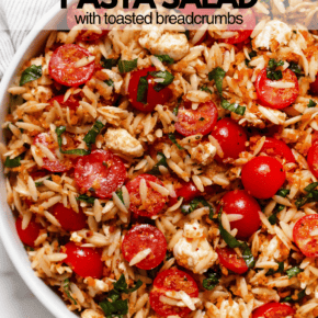 Caprese pasta salad in a serving bowl.