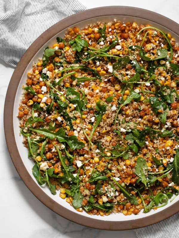 Roasted corn chickpea quinoa salad in a large bowl.