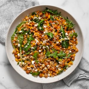 Roasted corn chickpea quinoa salad in a bowl.