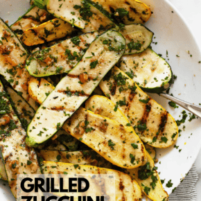 Grilled zucchini and yellow squash in a bowl.