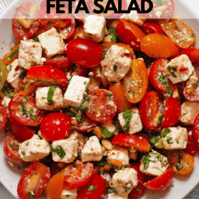 Celebrate the best of tomato season with this simple marinated tomato feta salad. Halved cherry tomatoes and cubes of feta are gently tossed in a quick homemade balsamic vinaigrette with garlic, red onions, and fresh parsley. Folded with toasted pine nuts and fresh basil ribbons, this no-lettuce dish is the ultimate summer salad. Enjoy it right away or let the flavors soak in for delicious leftovers. It is a must-add to your healthy salad recipes and favorite easy summer recipes.